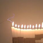 Experimento de laboratorio que buscaba estudiar la conductividad del fuego